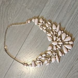 Pastel nude blushing color statement necklace from Aldo